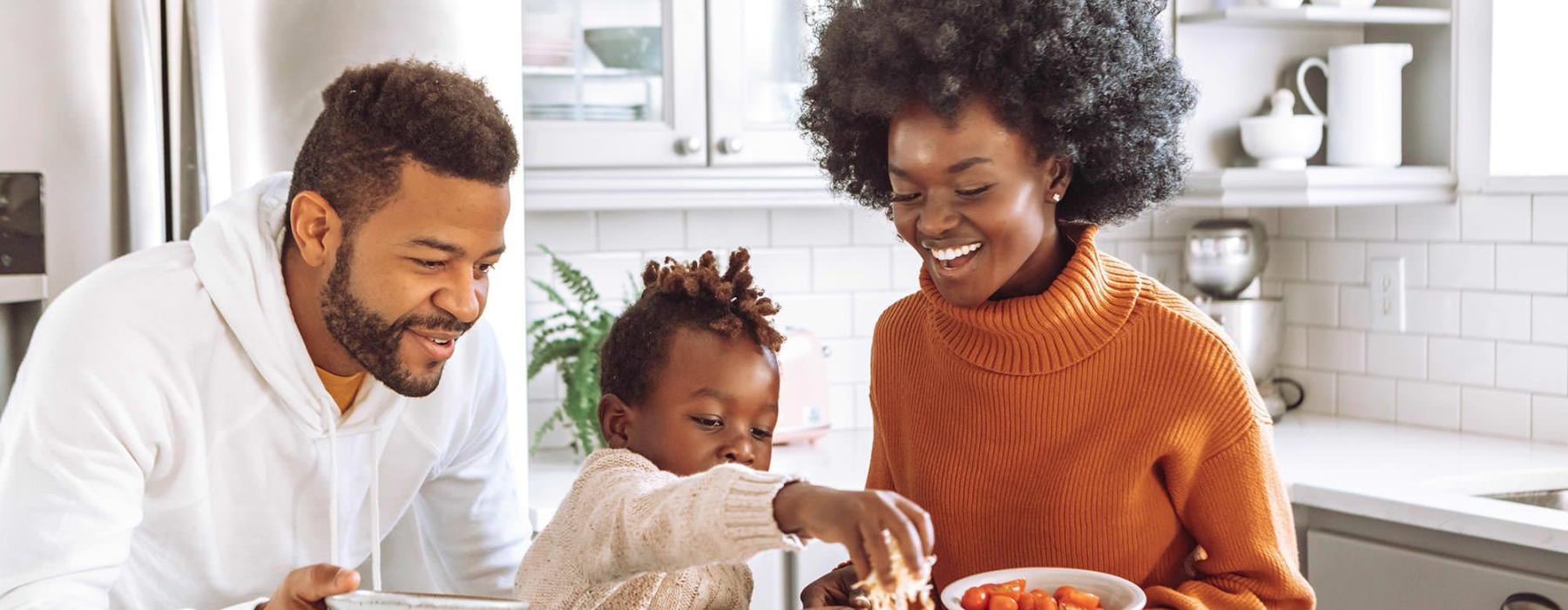 a family cooking together